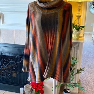 Swing around town  in this perfect   perfect Italian turtleneck sweater